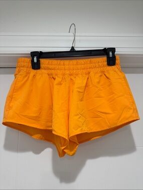 Offline by Aerie Orange Athletic Shorts with Elastic Waistband